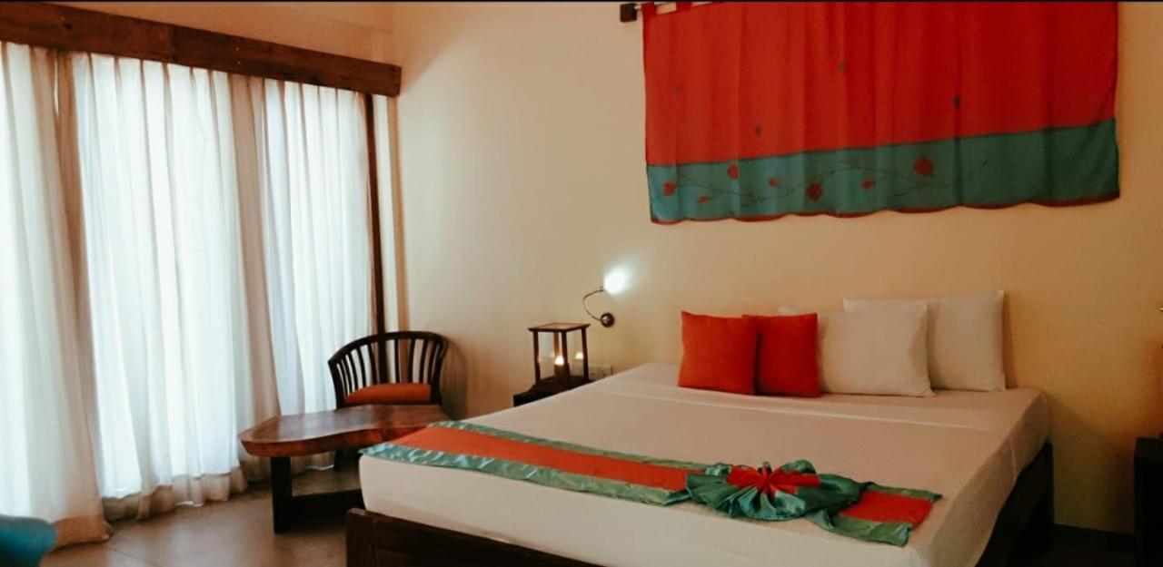Giman Free Beach Resort Passikudah Esterno foto